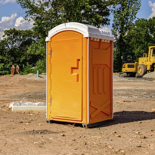 how often are the portable restrooms cleaned and serviced during a rental period in Liberty County